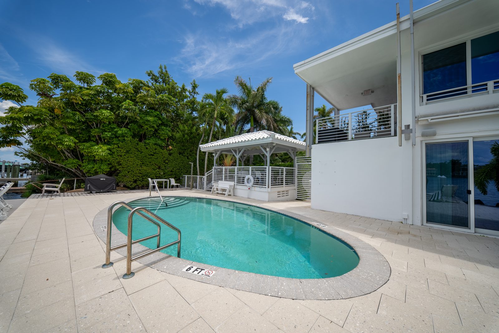 Pool deck by the water at a Miami condo