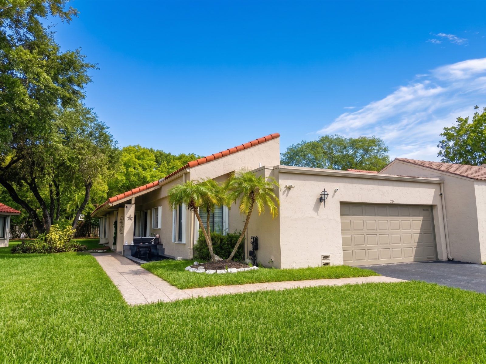 Front yard of a single-family home in Weston